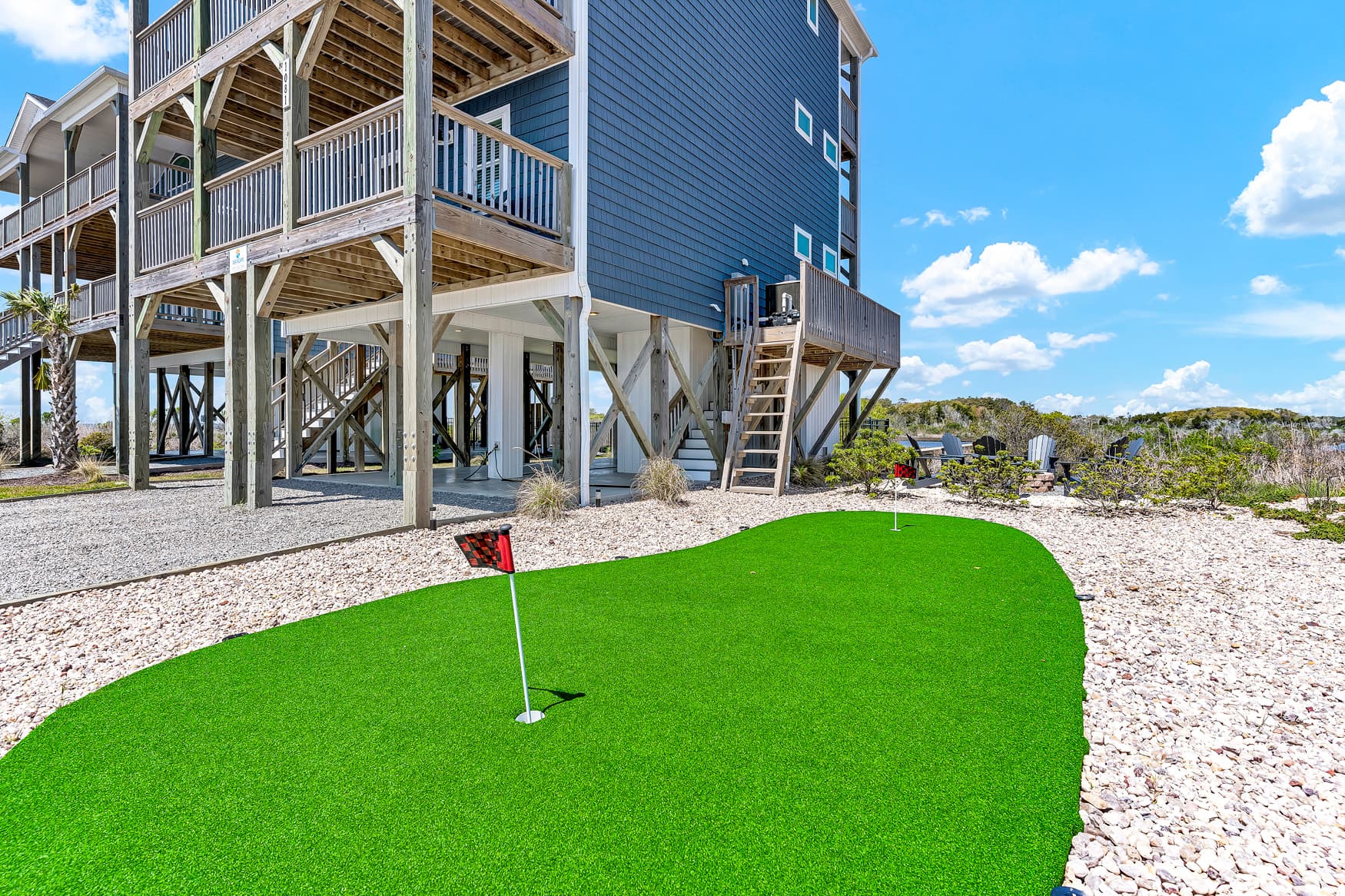 Putting green with clubs and balls included