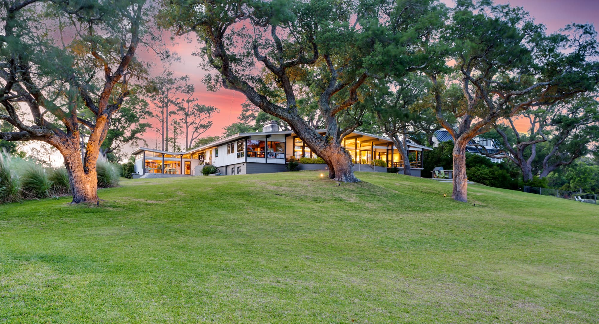 Beautiful rolling lawn for outdoor gathering and games by the water