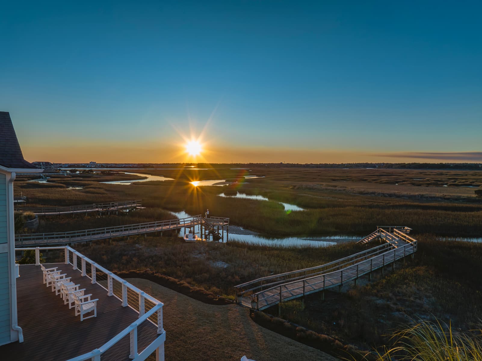 Soak in the sunset from the top level deck