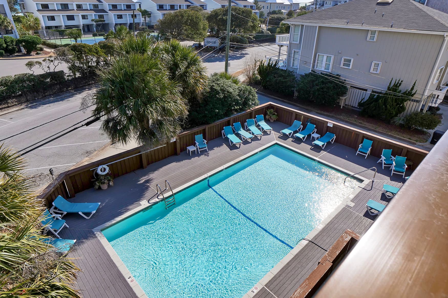 Sparkling resort pool close to the ocean and local tourist attractions.