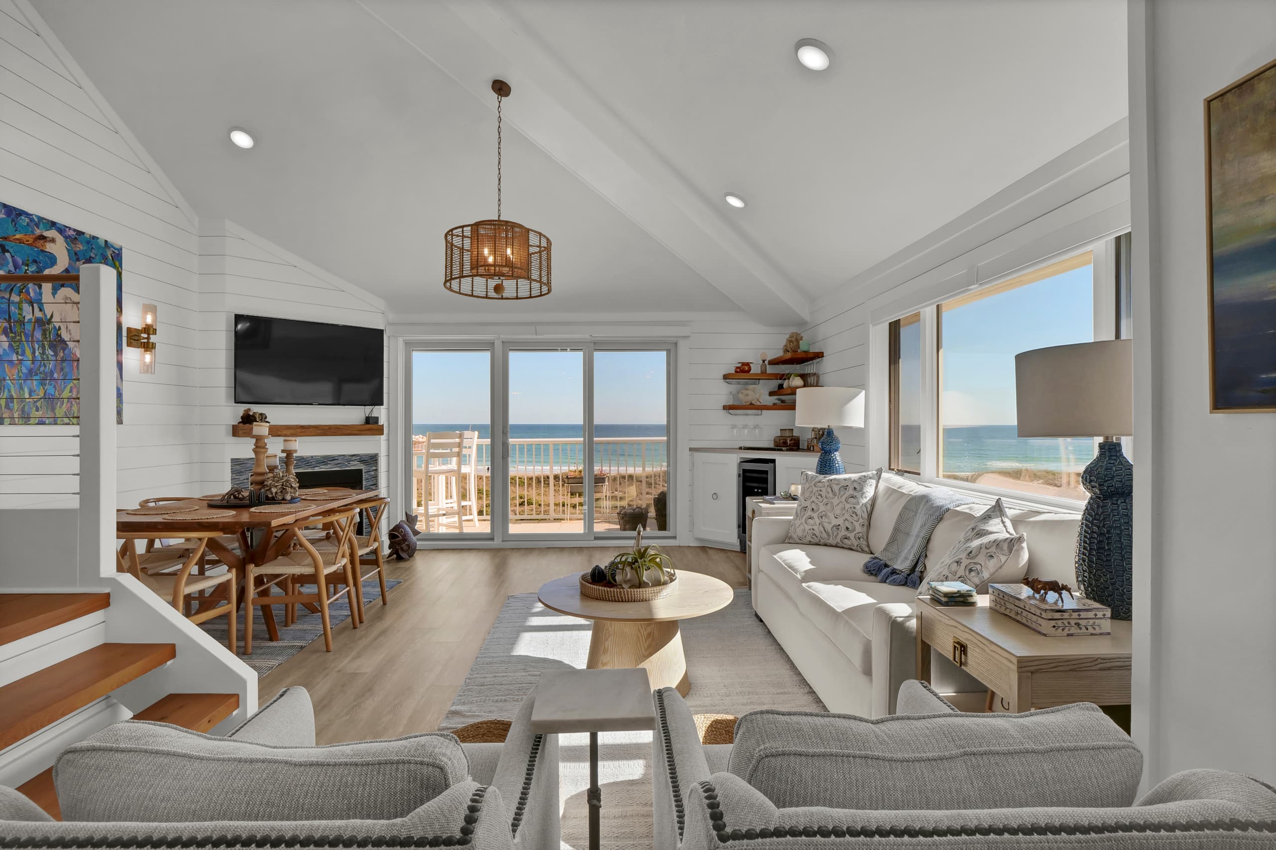 Cozy seating area steps from the balcony overlooking the waves