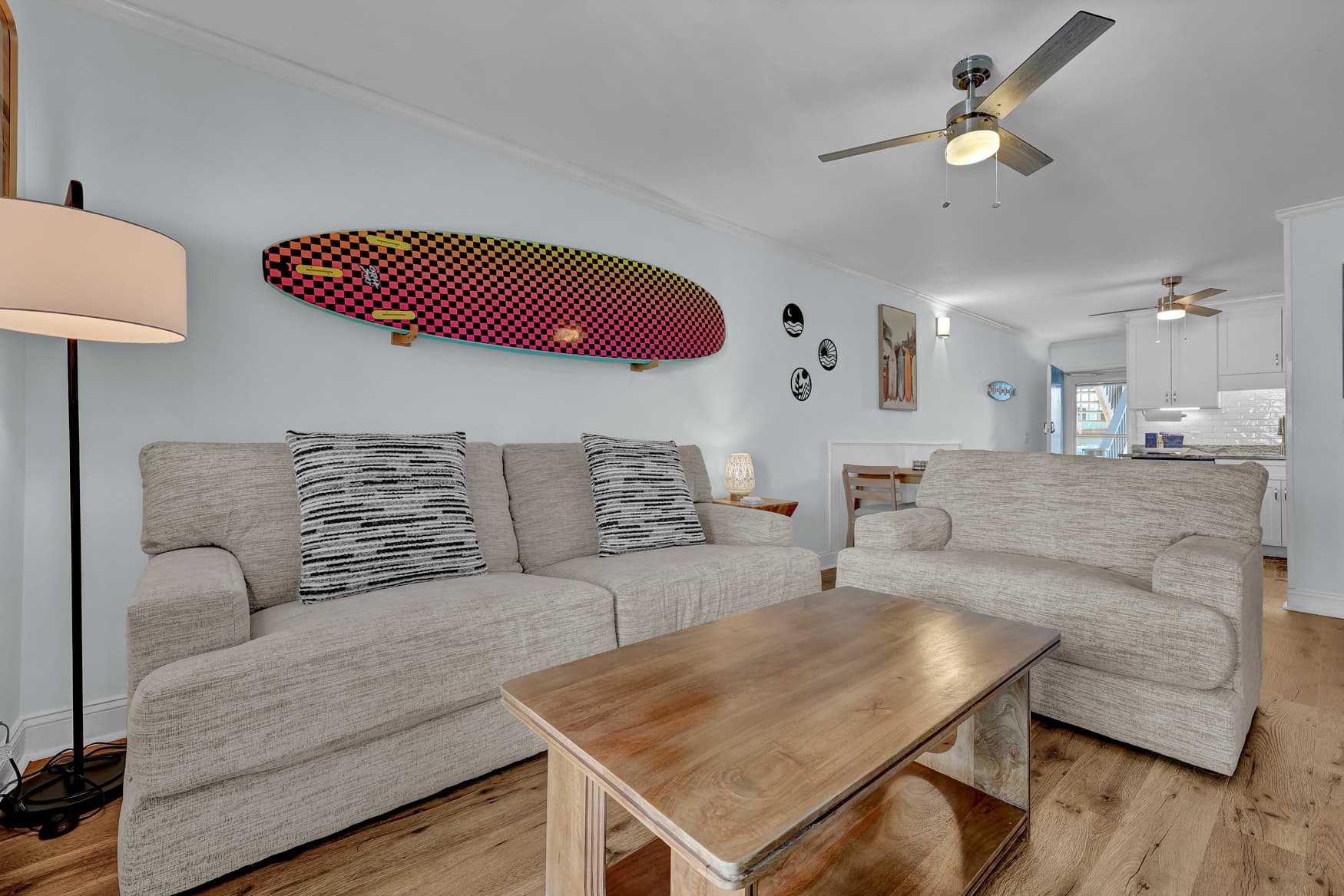 living room with surfboard decor