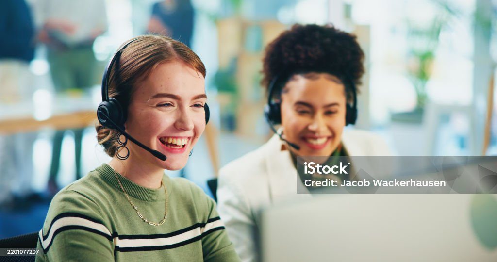 Friendly support agents with headsets ready to help
