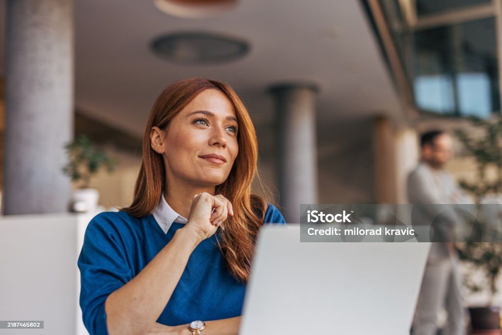 Woman reading about the beach gear program on her laptop