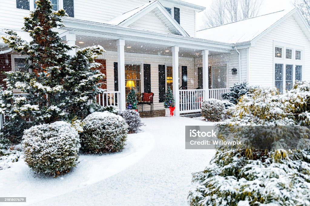 Cozy coastal home with a decorated front porch in winter