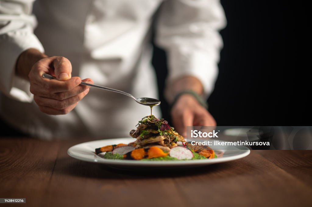 Chef plating an elegant dish