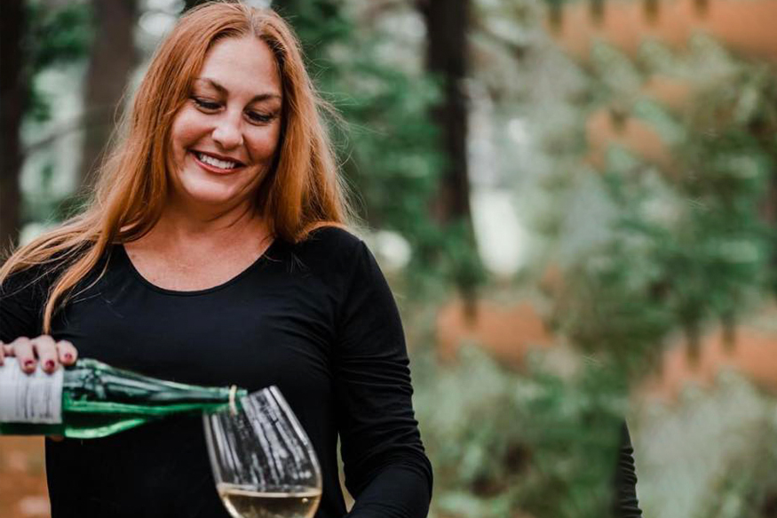 Sommelier pouring a glass of wine